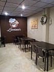 Lucciano's Pizza Y Cafe inside