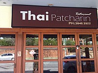 Thai Patcharin outside