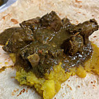 Leela's Roti Doubles Inc food