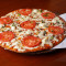 11 Home Crust Pizza,Fresh Tomatoes,Buffalo Mozzarella,Roasted Garlic,Sweet Basil
