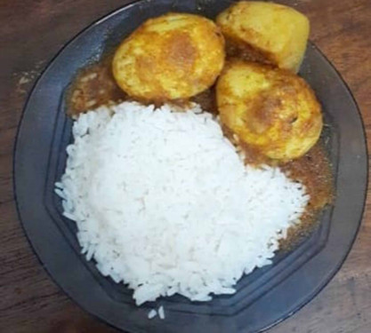 Hot Rice, Dal, Bhaja And 1 Pcs Egg Curry