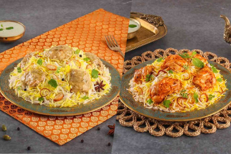 Cremiges Chicken Biryani (Murgh Afghani, 1 Portion) Chicken Tikka Biryani (Murgh Tikka, 1 Portion)