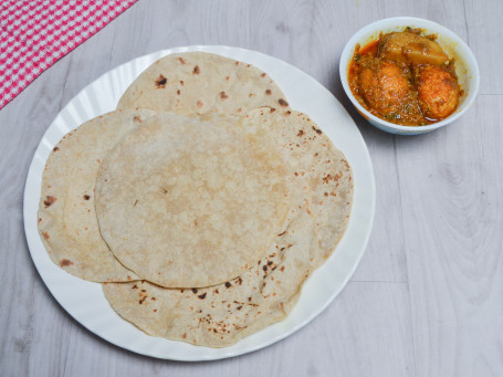 Egg Curry(2 Pcs) With Potato+ Tawa Roti(4 Pcs)