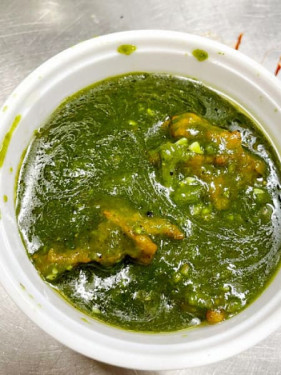 Fish In Green Coriender Sauce Gravy