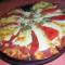 Pizza mit Schinken und Morrones