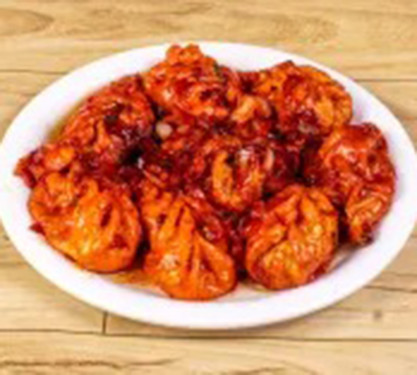 Chicken Pan Fried Momos In Schezwan Sauce 8 Pcs)