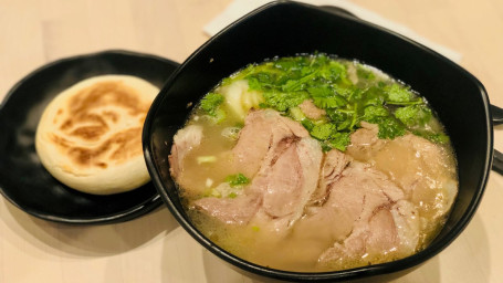 Braised Lamb Soup W/ Biscuit Shuǐ Pén Yáng Ròu Huì Bǐng