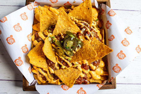 Cheesy Nacho With Salsa And Jalapeno