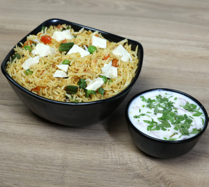 Paneer Tawa Pulao (Complimentary Raitha)