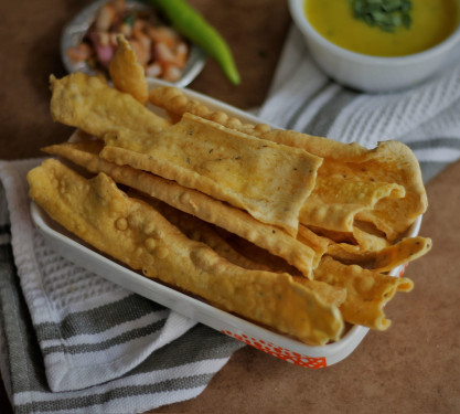 Fafda Served With Kadhi , Mirchi , Papita