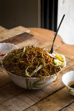 Schezwan Noodles Veg Served With Ketchup