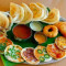 1 Onion Uttapam, 1Pc Idli, 2Pc Vada Served With Chutney