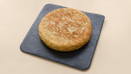 Tortilla De Patata Casera Con Cebolla