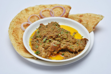 Chicken Masala(Quarter) With 2 Paratha Cold Drink (250Ml)