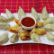 Steam Chicken Momos 12 Pcs, Chicken Spring Roll 6 Pcs, Served With Spicy Red Sauce Green Chutney