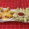 Steam Veg Momos 12 Pcs, Veg Spring Roll 6 Pcs, Served With Spicy Red Sauce And Green Chutney