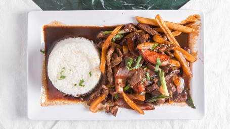 Lomo Saltado Carne O Pollo