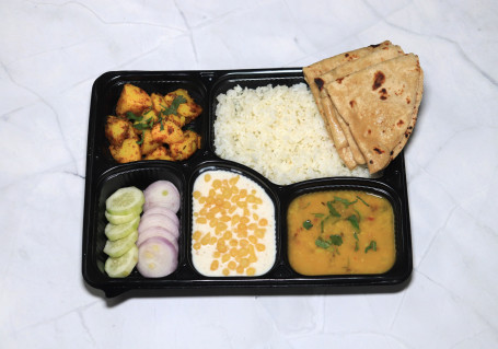 3 Roti, Veg. Sabzi, Daal, Rice, Salad, Raita