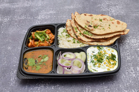 Aloo Gobhi Masala Dal Tadka Choice Of Rotis Rice Raita Salad