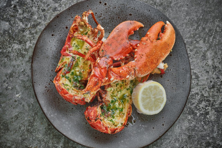 Grilled Native Lobster, Garlic Butter, Chips Salad