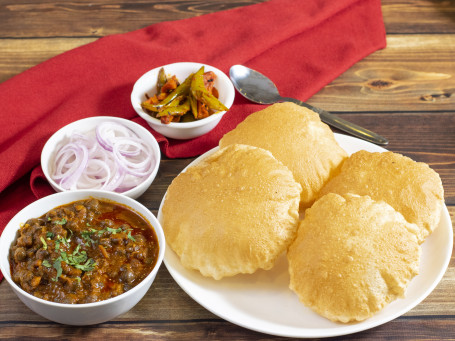 Poori Thali Plate (Special Desi Ghee Puriwith Channa, Aloo Bhaji, Petha Bhaji Moong Dal Halwa)