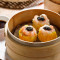 sōng lù shāo mài huáng Pork Dumplings with Black Truffle Sauce