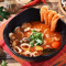 Suān Là Hǎi Xiān Hé Fěn Sour And Spicy Seafood Flat Rice Noodles