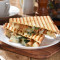 Jiǔ Céng Tǎ Xūn Jī Pà Ní Ní Smoked Chicken Panini With Basil