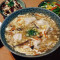 Suān Là Tāng Jiǎo Dumplings In Hot And Sour Soup
