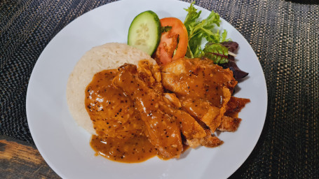 Deep Fried Chicken Leg With Black Pepper Sauce On Rice