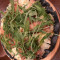 Parma Ham And Rockets Pizza In Squid Ink Sauce
