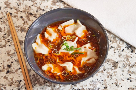 Dumplings In Szechuan Sauce