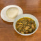 Bitterleaf soup served with a choice of Pounded Yam, Eba or Amala