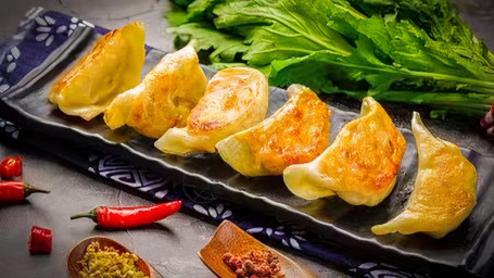 A7. 4 Piece Pot Stickers Pan Fried