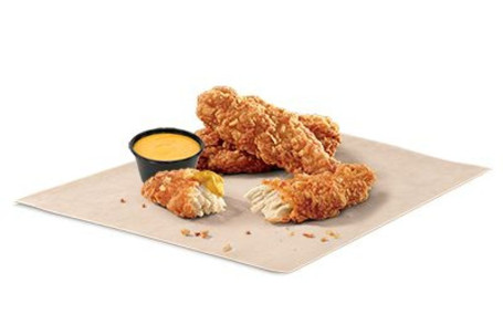 Three Crispy Chicken Tenders With Nacho Cheese Sauce