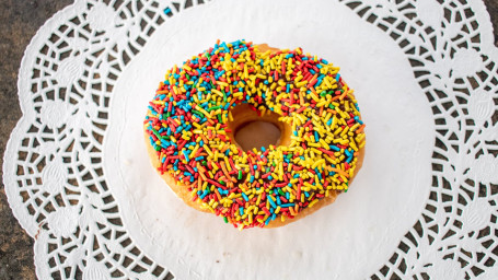 Raised Frosted Donut With Sprinkles