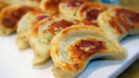 Pan Fried Chicken Dumplings (8) Jiān Jiǎo