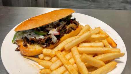 Cheese Steak Philly With French Fries .