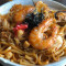 65. Kimchi Seafood Fried Udon Pào Cài Hǎi Xiān Chǎo Wū Dōng