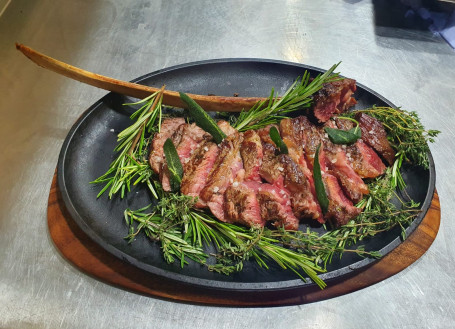 Tomahawk With Roast Potatoes And Green Salad