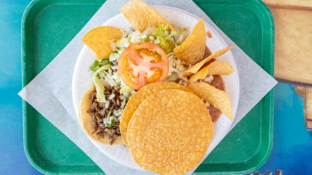 #25. Tostada Y Taco Combo