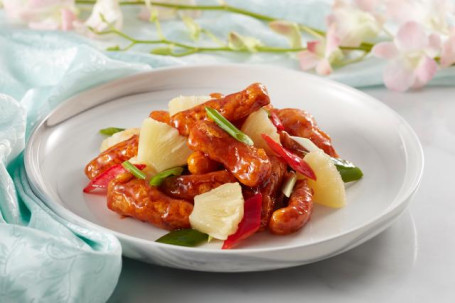 Bō Luó Gū Lǔ Ròu Sautéed Pork With Sweet Sour Sauce