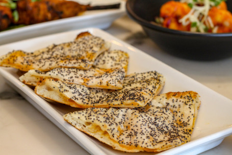 Cheese Grilled Naan With Red Leicester And Poppy Seeds