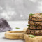 Black Bean Quinoa Burger Over Mixed Greens