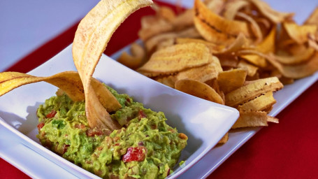 Plantain chips with guacamole