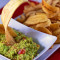 Plantain chips with guacamole